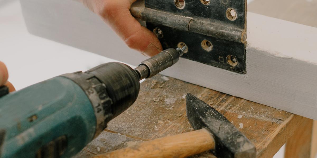 Drilling a hole in window frame